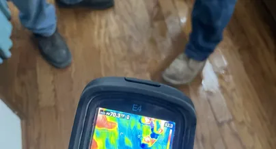 Thermal imaging camera scanning a wall