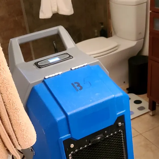 Dehumidifier drying a bathroom, Central LA