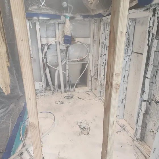 Bathroom stripped to the framing, South Bay