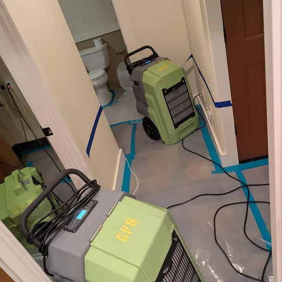 Drying a bathroom inside containment, Greater Seattle