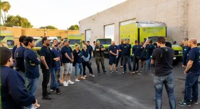 Green Planet Restoration crew with response trucks