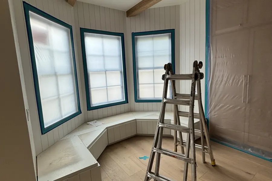 Windows sealed with plastic sheeting during repairs